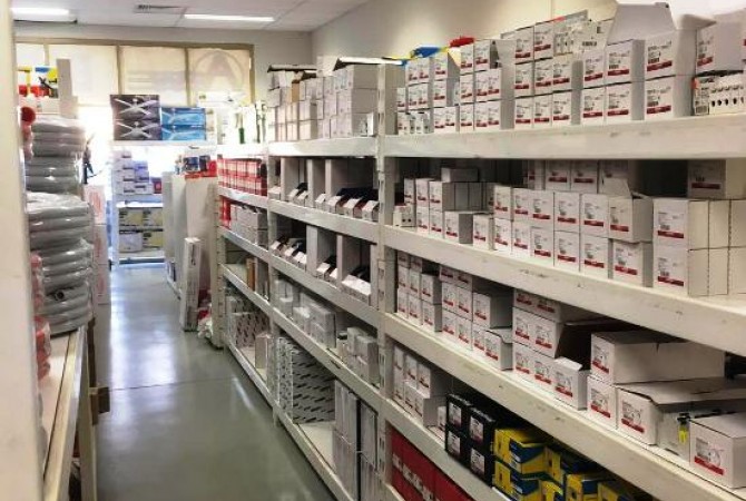 Inside the AIEW St Marys warehouse — fully stocked shelves of electrical supplies.